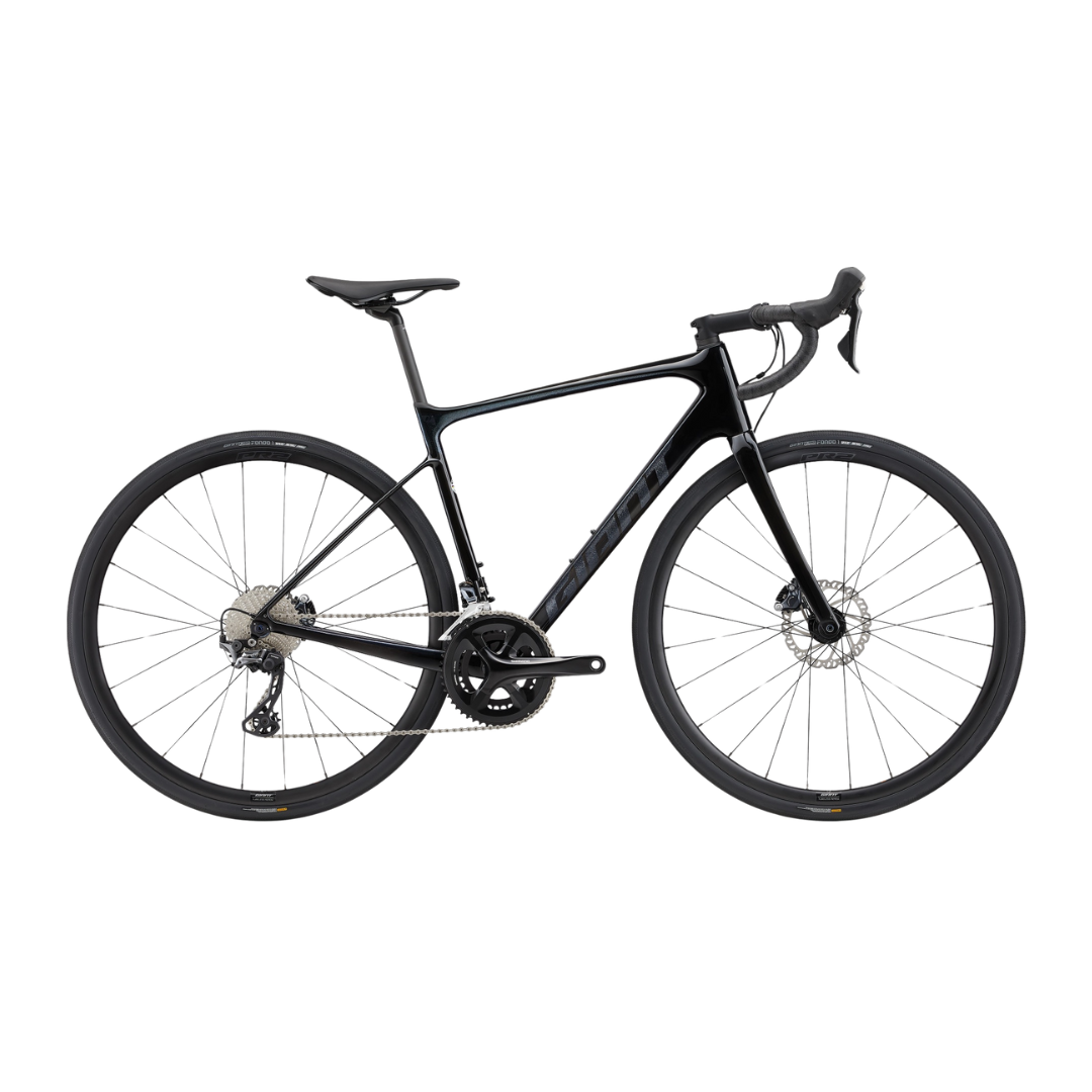 Side view of the Giant Defy Advanced 1 in Carbon/Starry Night with sleek geometry.