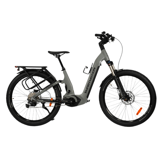 Side view of the Smartmotion Xcapade E-Bike showcasing its sleek design and dual suspension.