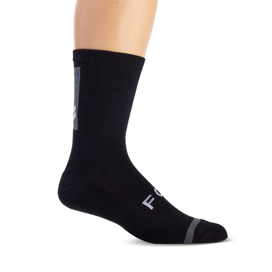 FOX 8" Defend Sock in Black, laid flat to show the long cuff.